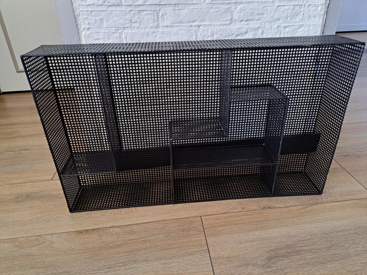 Te koop zwart metaal wandrek nieuw in doos