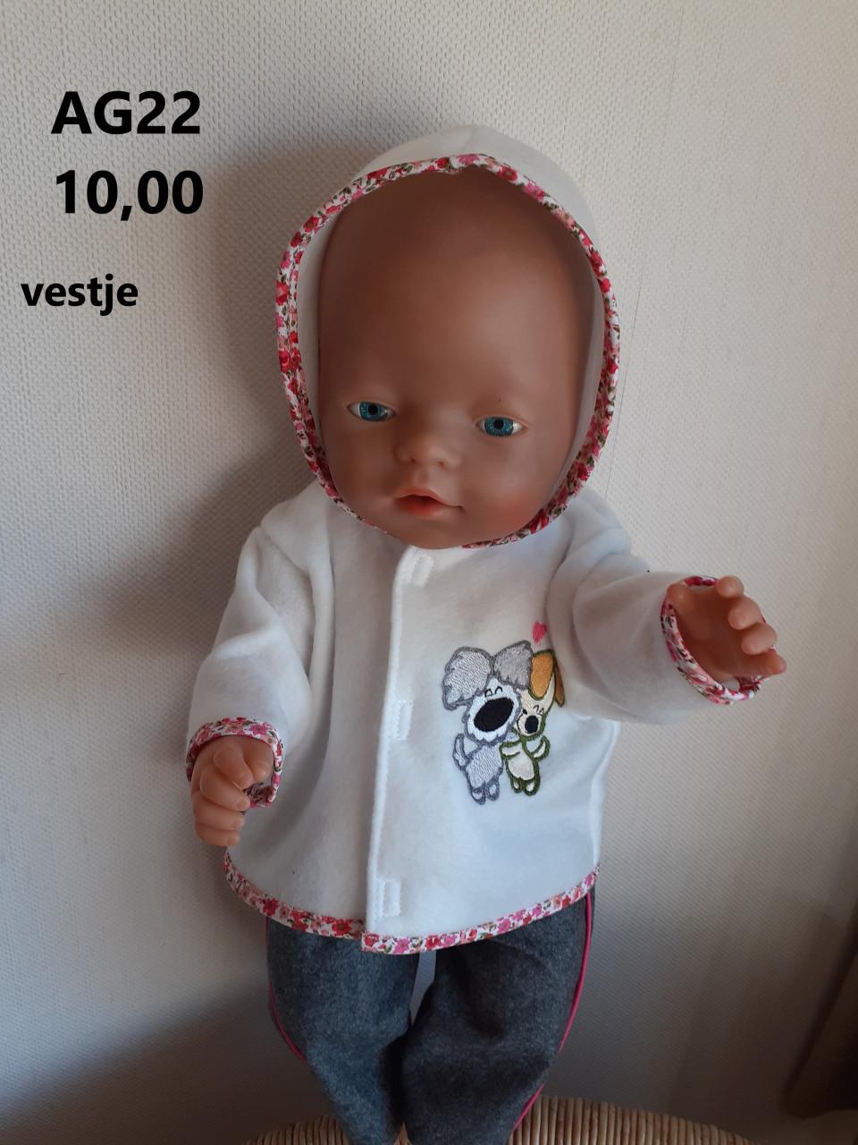 Poppenkleertjes baby born. Vestje Woezel en Pip. Opbrengst KiKa.