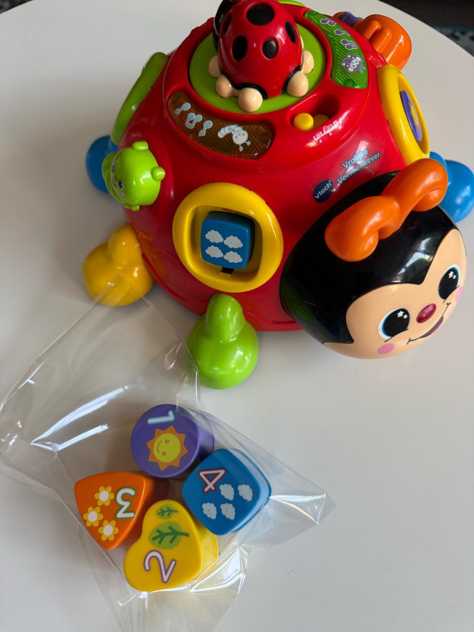 Vtech speelgoed baby kevertje met vormpjes en muziek.