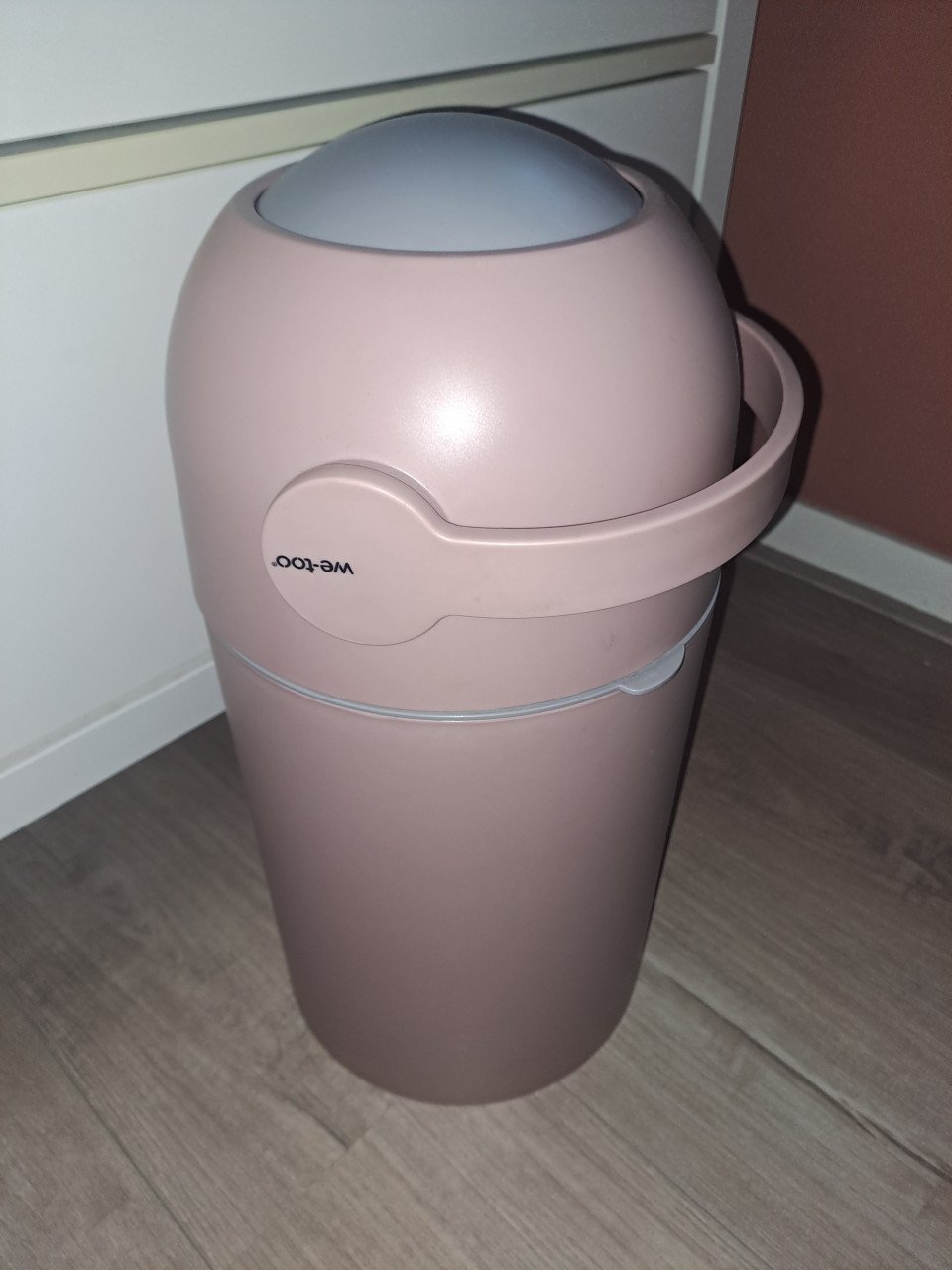 We-too oud roze luieremmer