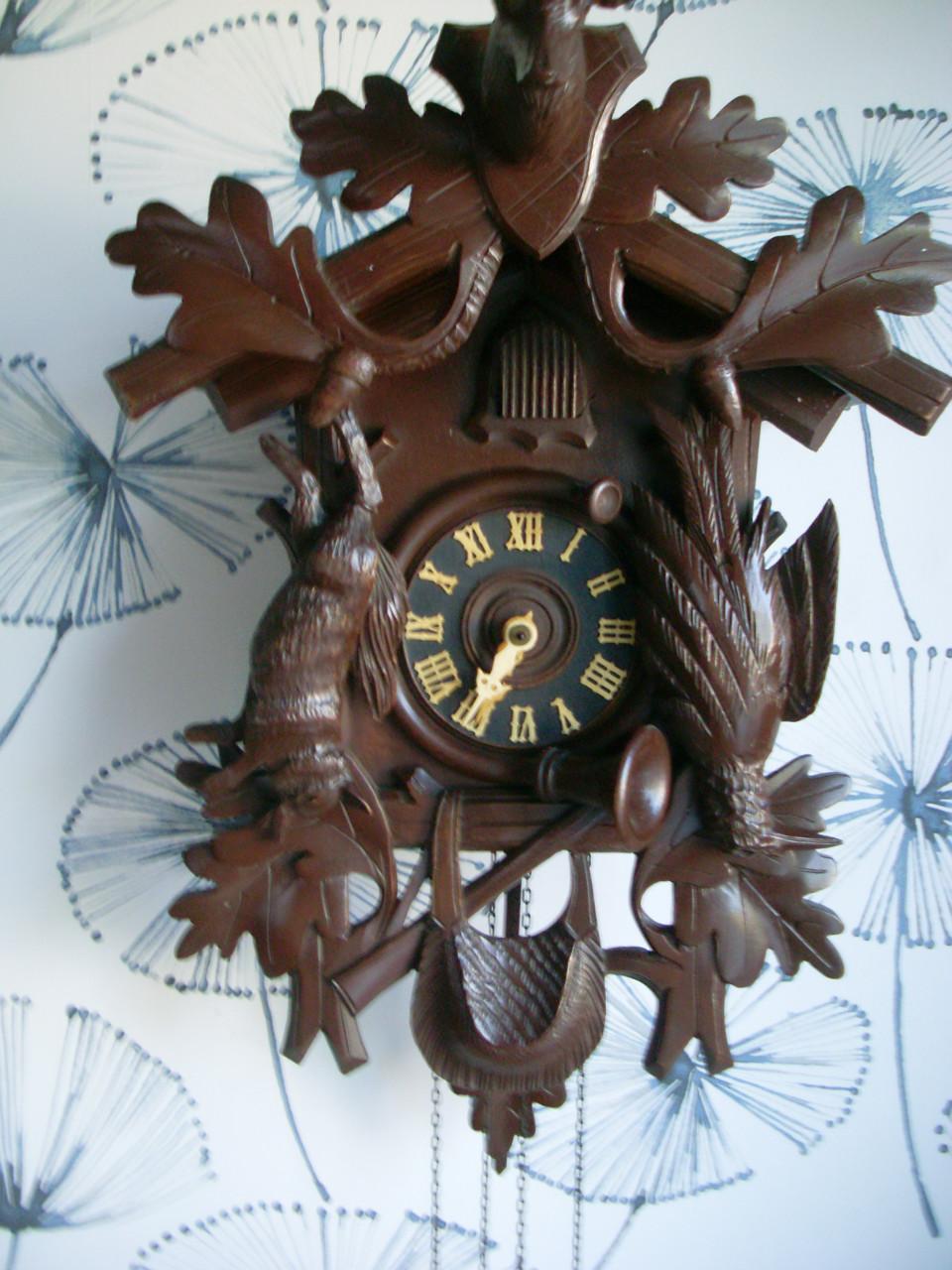 Houten koekoeksklok met slinger