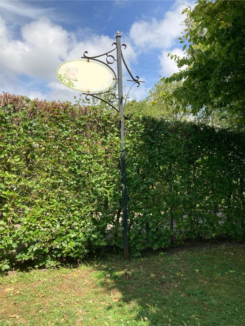 Uithangbord met paal