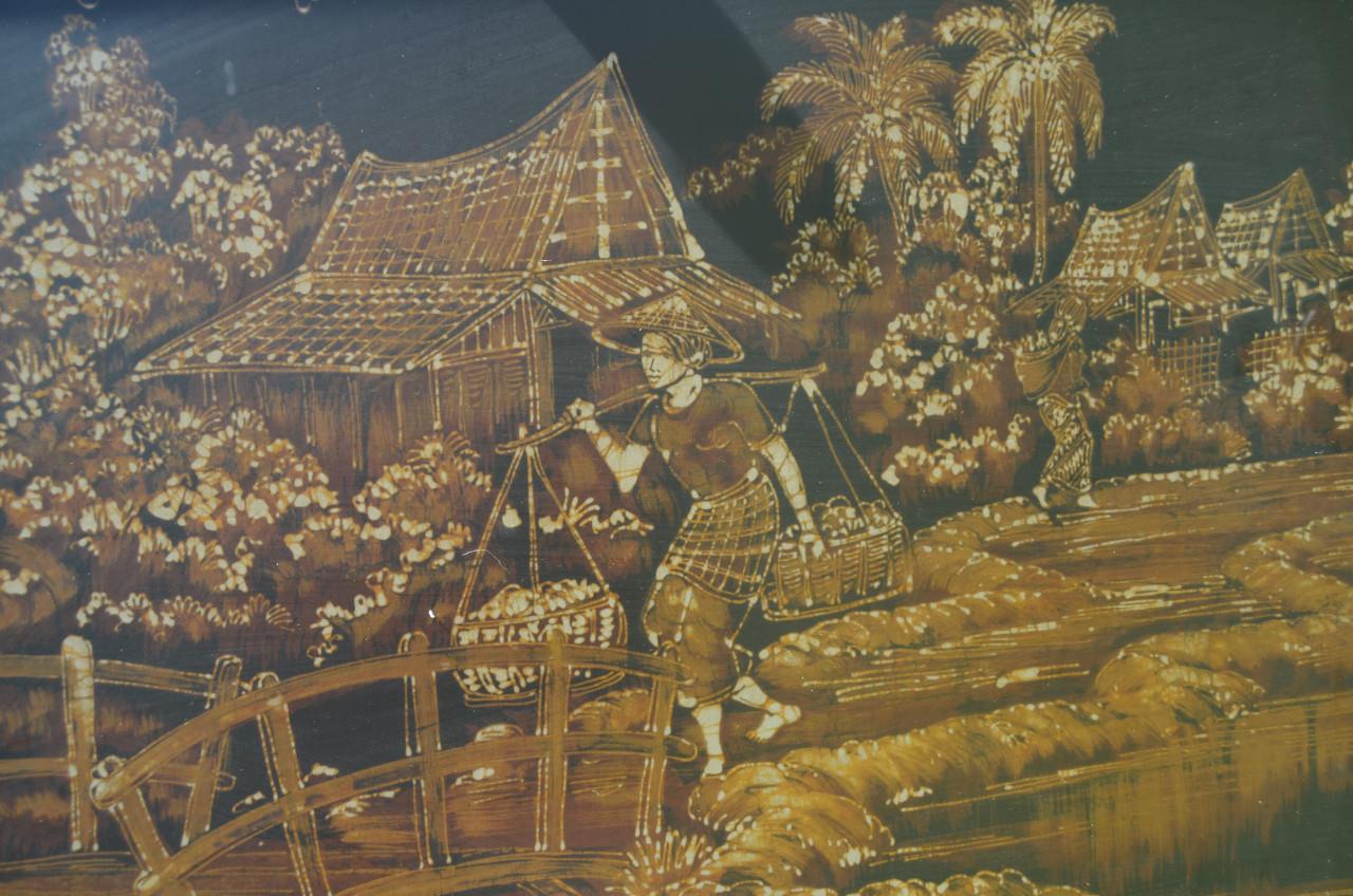 Grote Indonesische batik 'Indonesisch dorp met draagster'.
