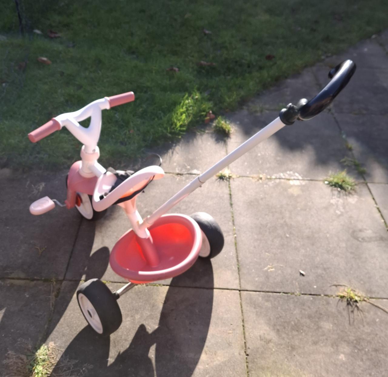 Driewieler Smoby met duwstang