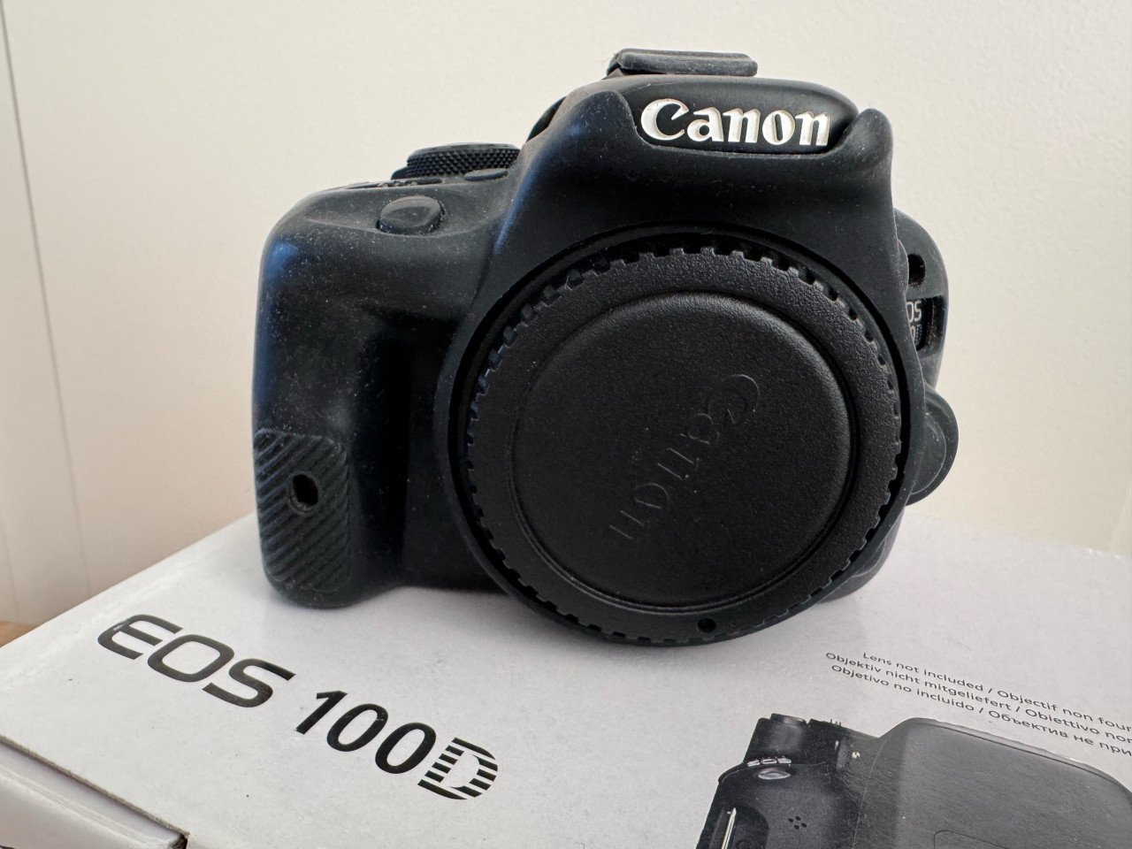 Compacte Canon EOS 100D camerabody + diverse accessoires