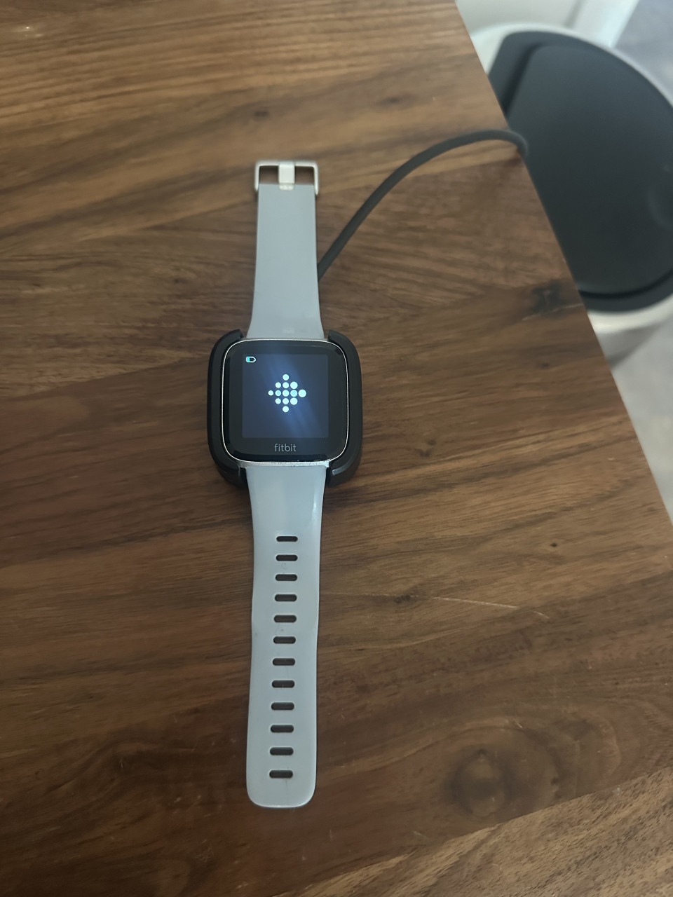 Fitbit Versa met grijs bandje