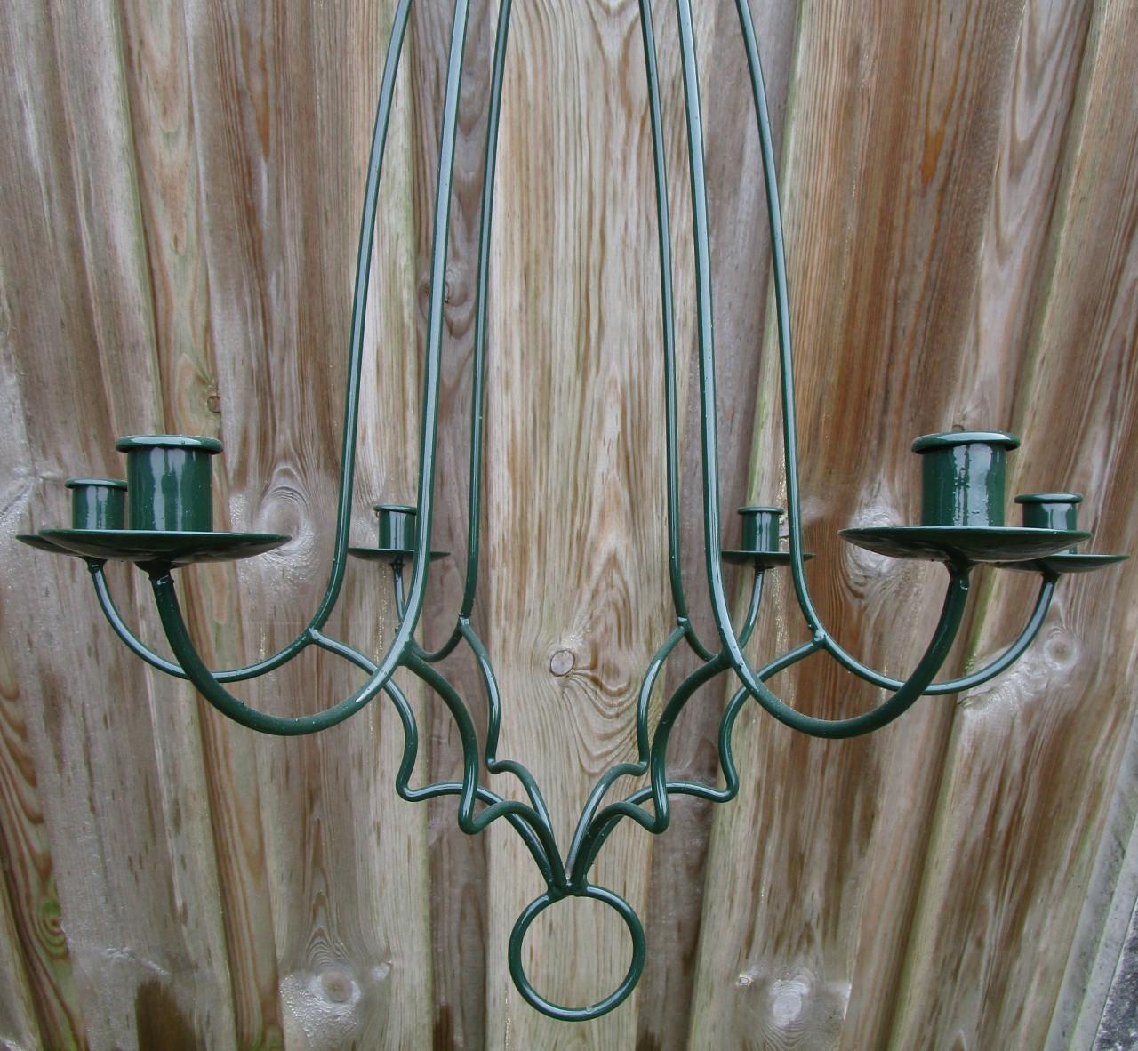 Mooie donker groene Kroonluchter voor kaarsen.