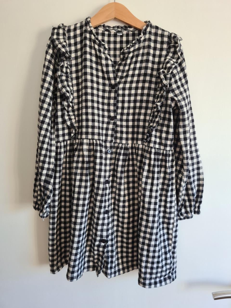 Zwart-wit geblokt jurkje met roezel van Zeeman  Maat 134-140