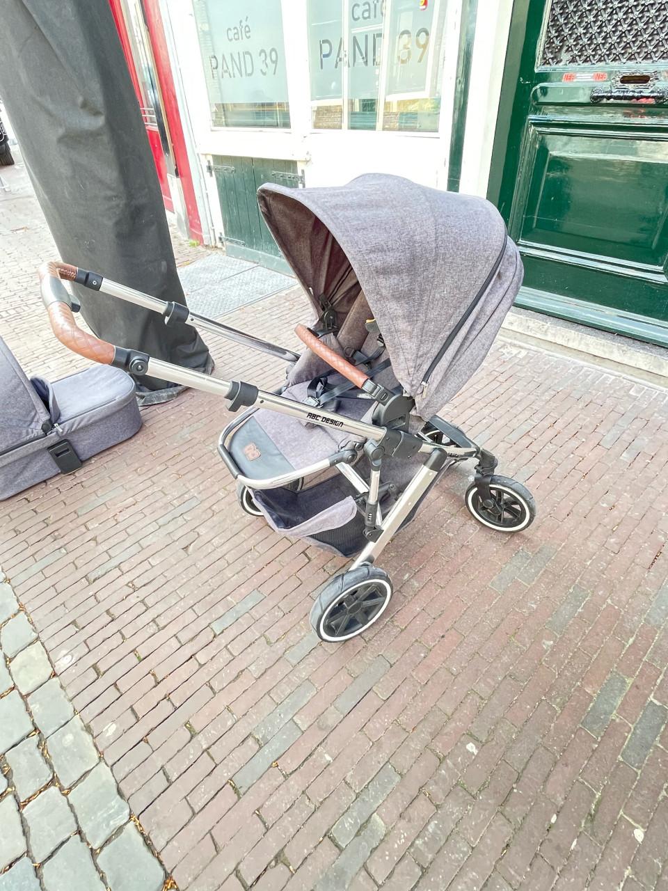 LUXE KINDERWAGEN MET VERING EN LUCHTBANDEN EN 50+ SUNPROTECTION