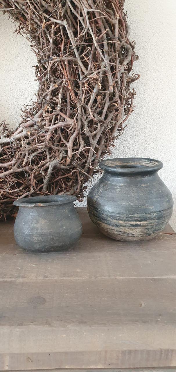 Oude tuimelpotjes prachtig doorleefd