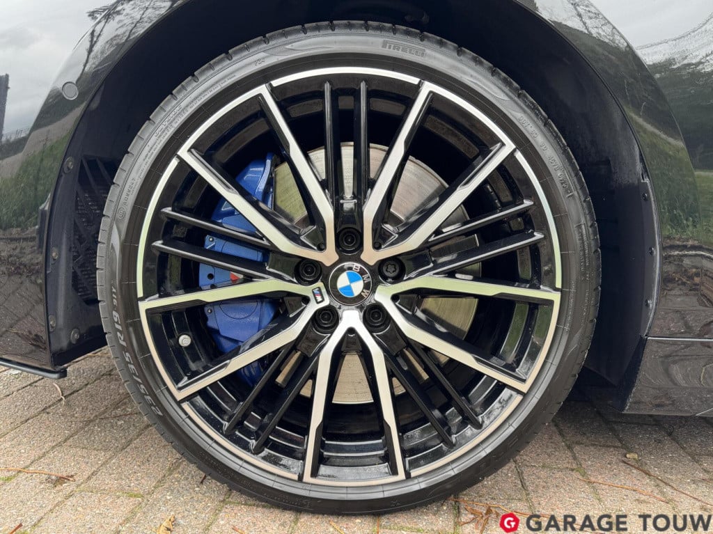 BMW 1 Serie m135i xdrive high executive edition pano orig.nl