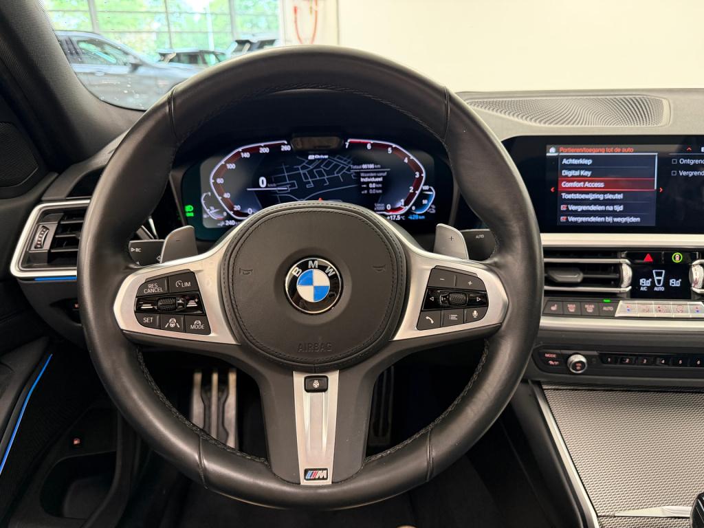 BMW 3-serie 330e m-sport | schuif/kanteldak | elektrische stoelen | verwarm