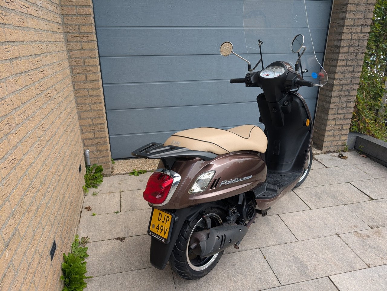 Zeer nette Sym Fiddle II scooter met slechts 4700 echte km op de teller