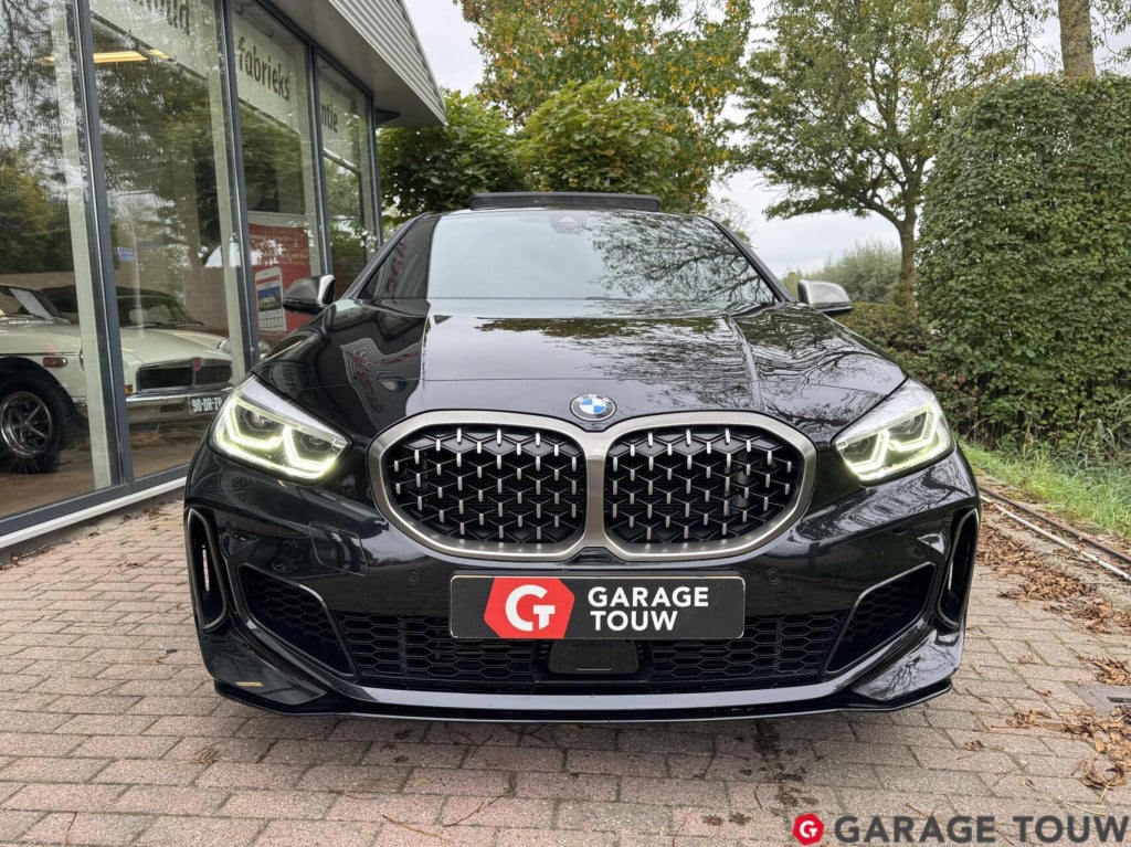BMW 1 Serie m135i xdrive high executive edition pano orig.nl