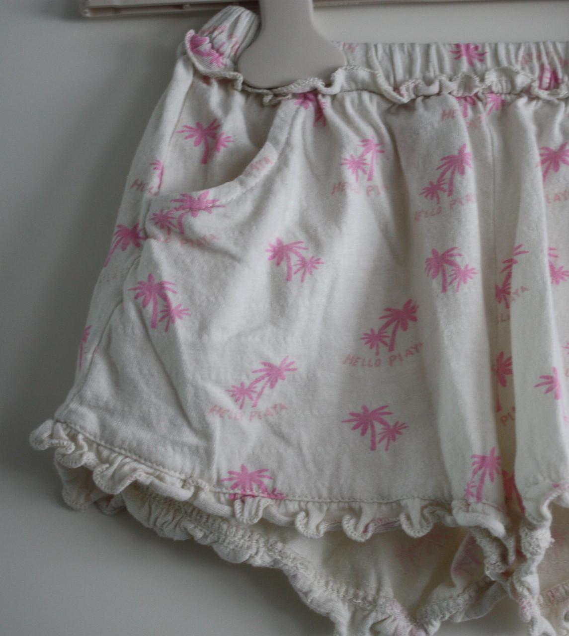 Wit kort broekje met roze palmbomen maat 98