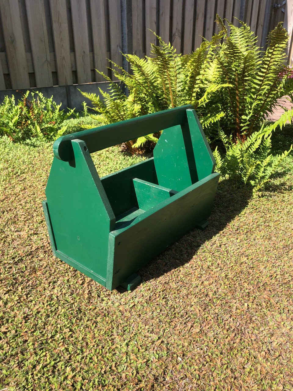 Groene houten bak.