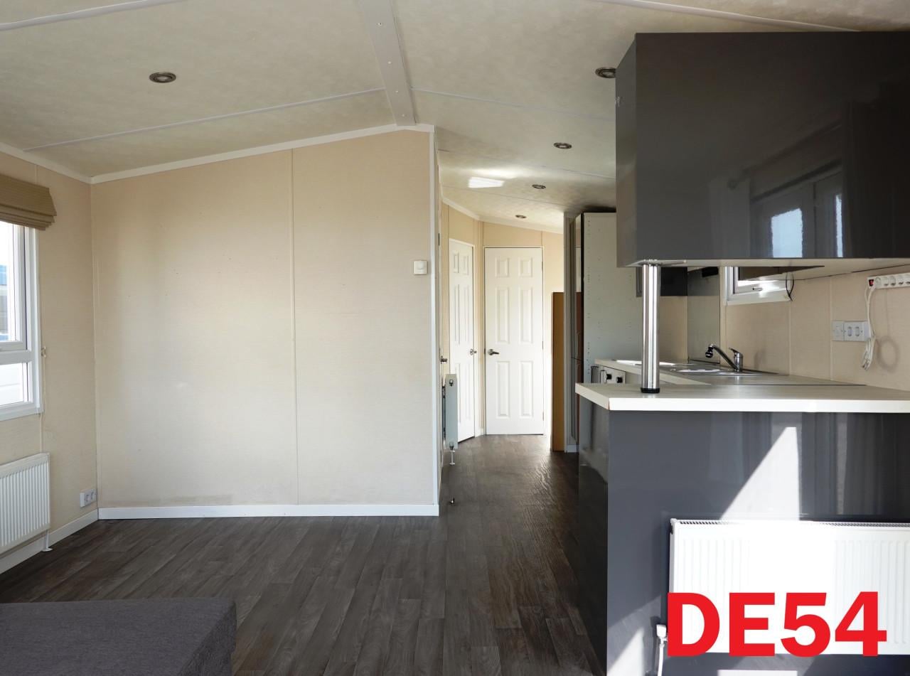 Keurig chalet met 2 slk, dubbel glas en centrale verwarming te koop!
