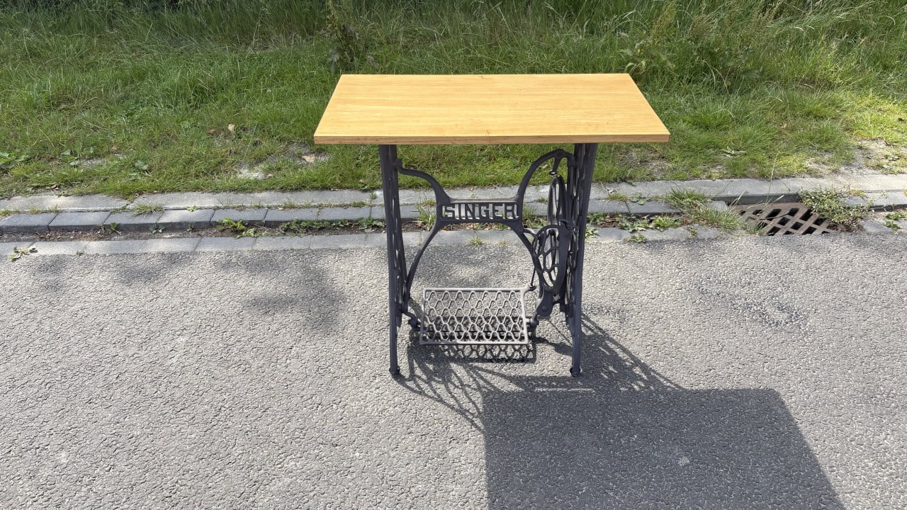 Binnen of buiten tafel op Singer