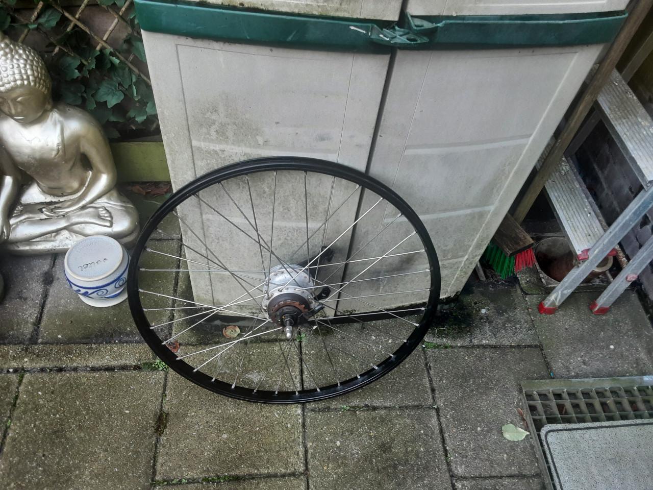 26 x 1,75 inch nexus achterwiel, 7 speed,rollerbrake rem