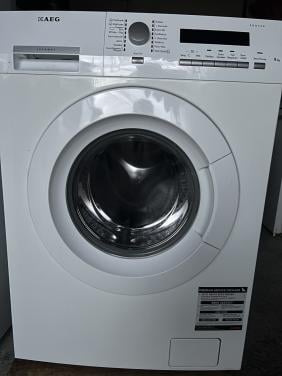 A+++ klasse AEG Wasmachine 8!kg. 1400 toren als nieuw met boekjes en bon