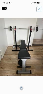Halterbanl met stang en gewichten