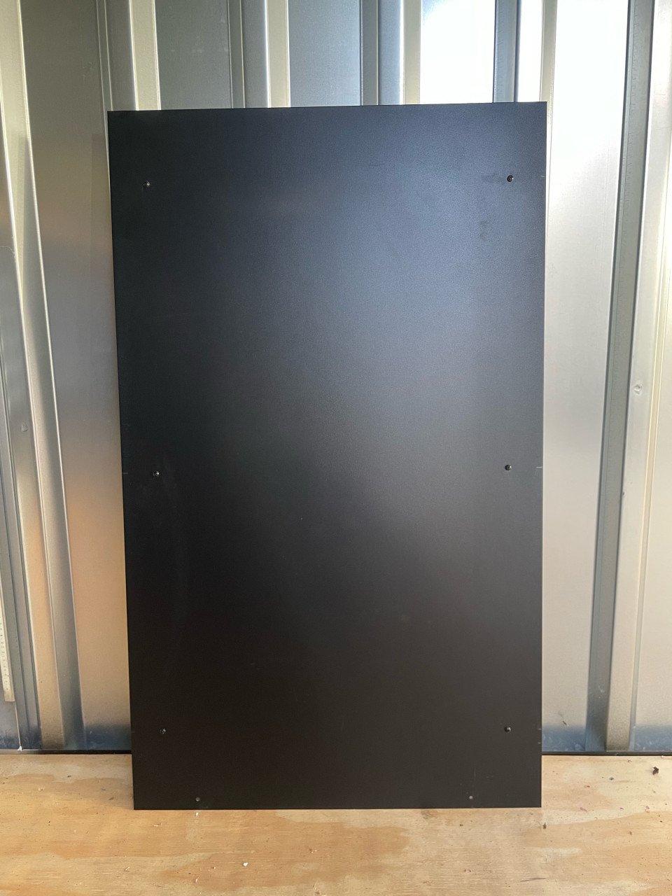 Zwarte stalen wandplaat voor kachel 60 x 100 cm