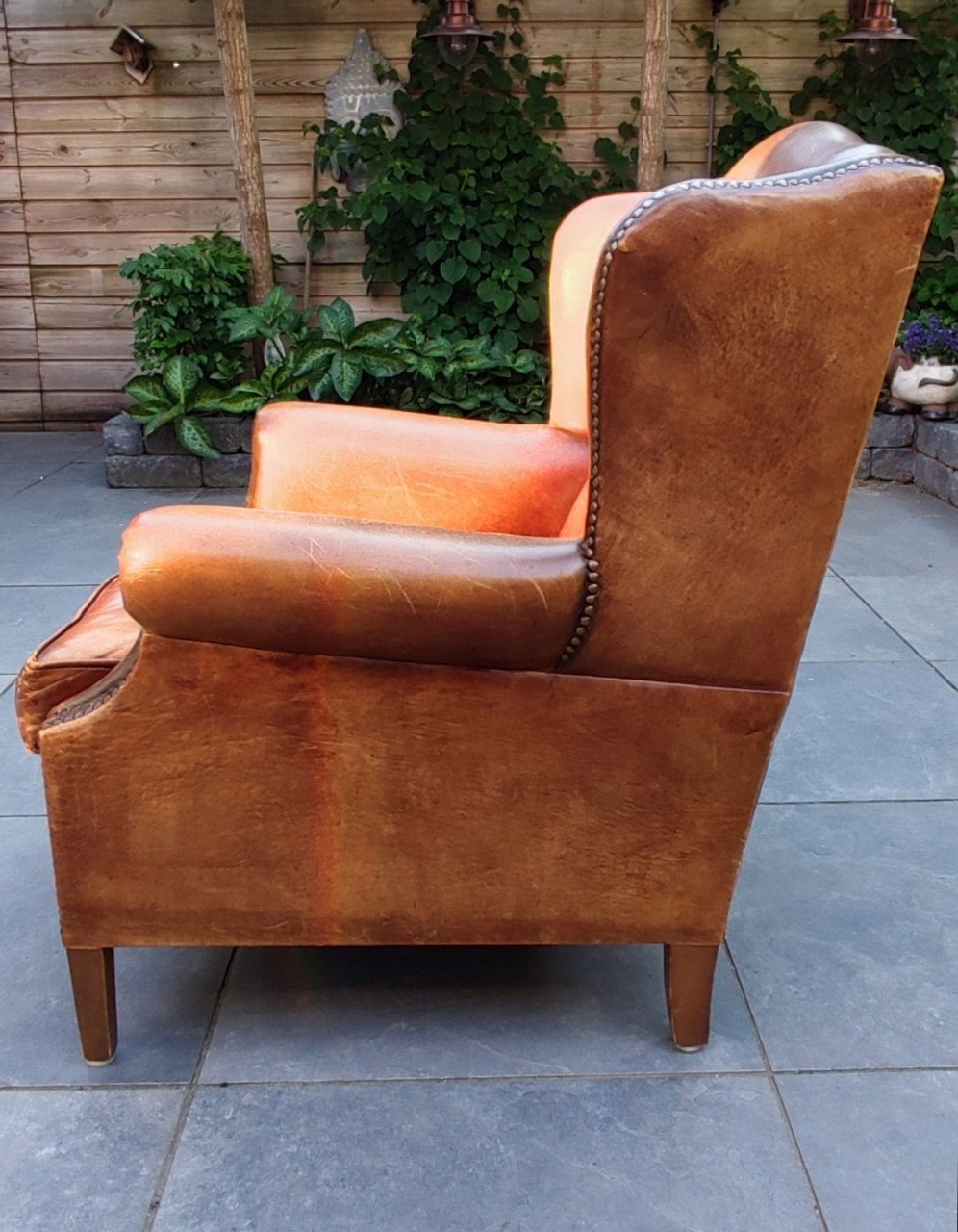 Antieke schapenleren fauteuil