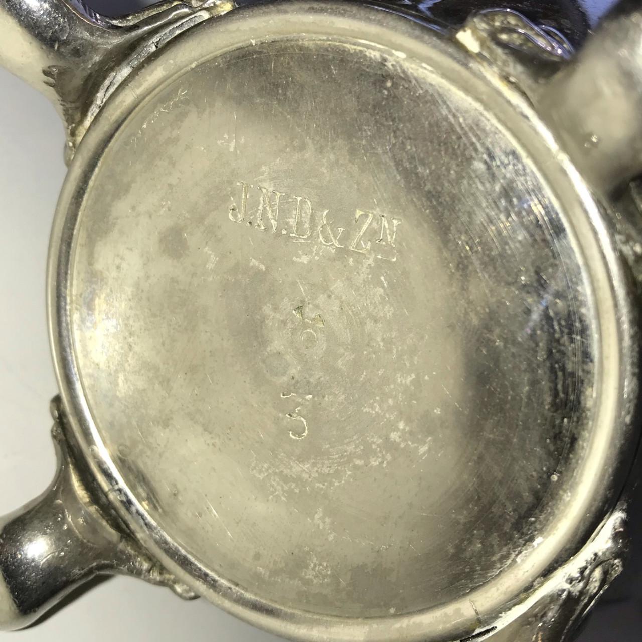 J. N. Daalderop koffiepot en theepot met warmhoudstel