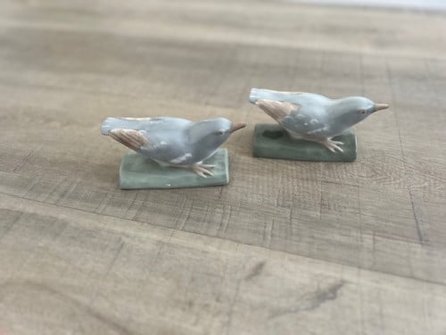 Handgeschilderde porseleinen vogels