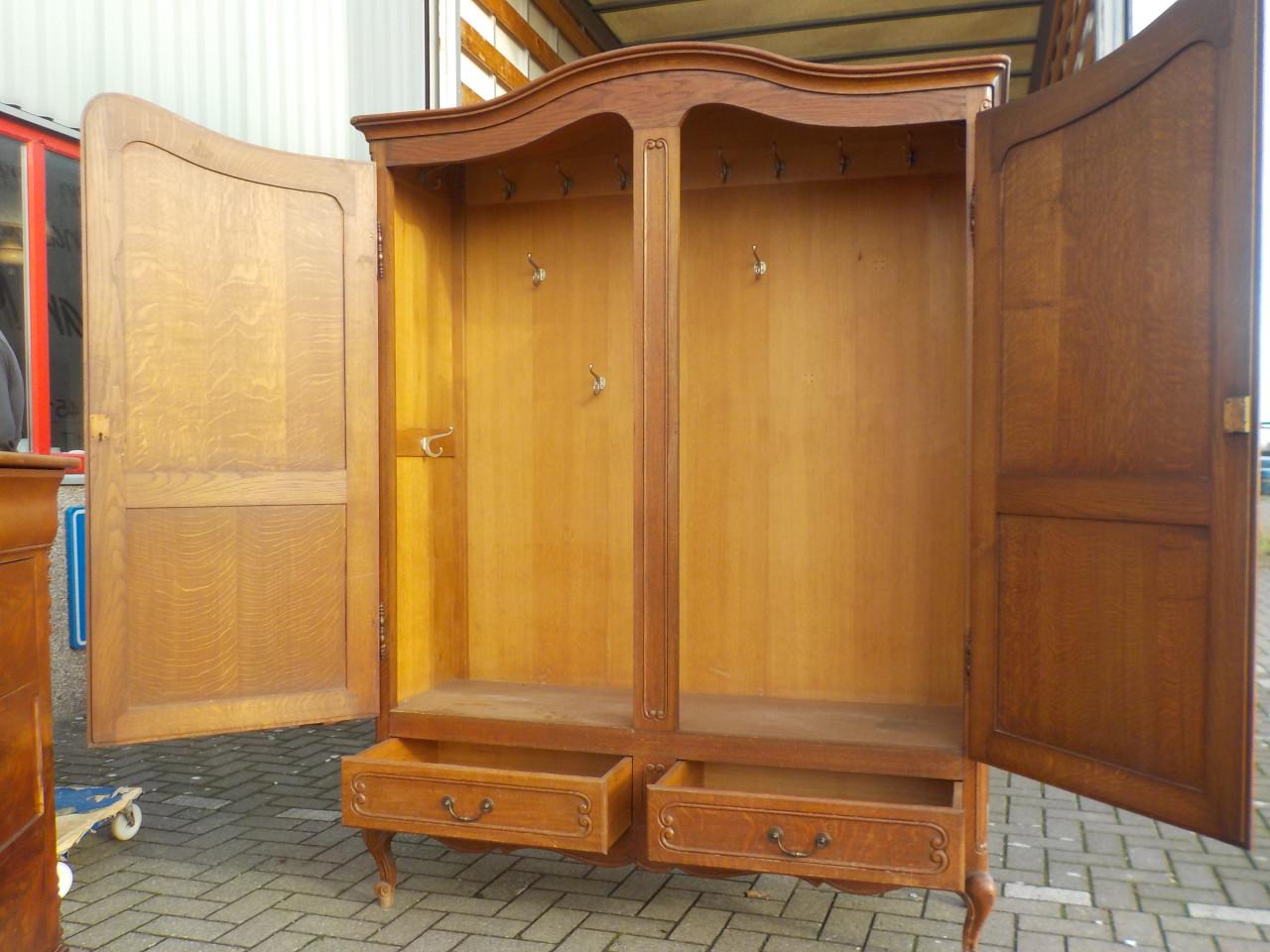 Mooie kwaliteit massief eiken kapstokkast met 2 laden in zeer goede staat