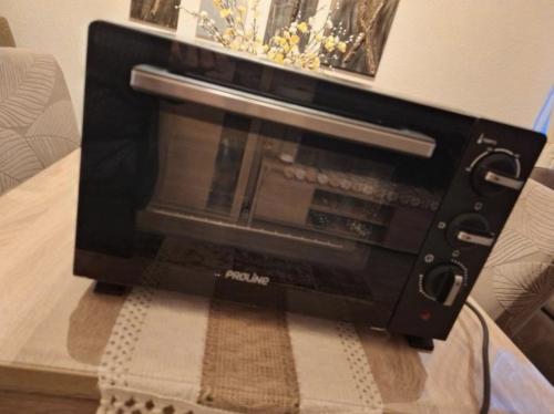 Handige Bakoven voor op de camping, kamer of tijdens verbouwing