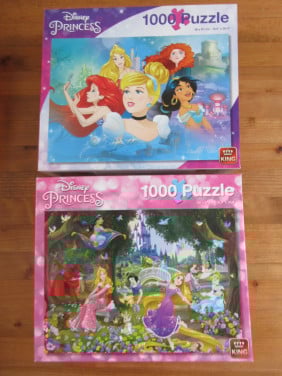 2 leuke volledige puzzels van Disney van 1000 stukjes, zo goed als nieuw