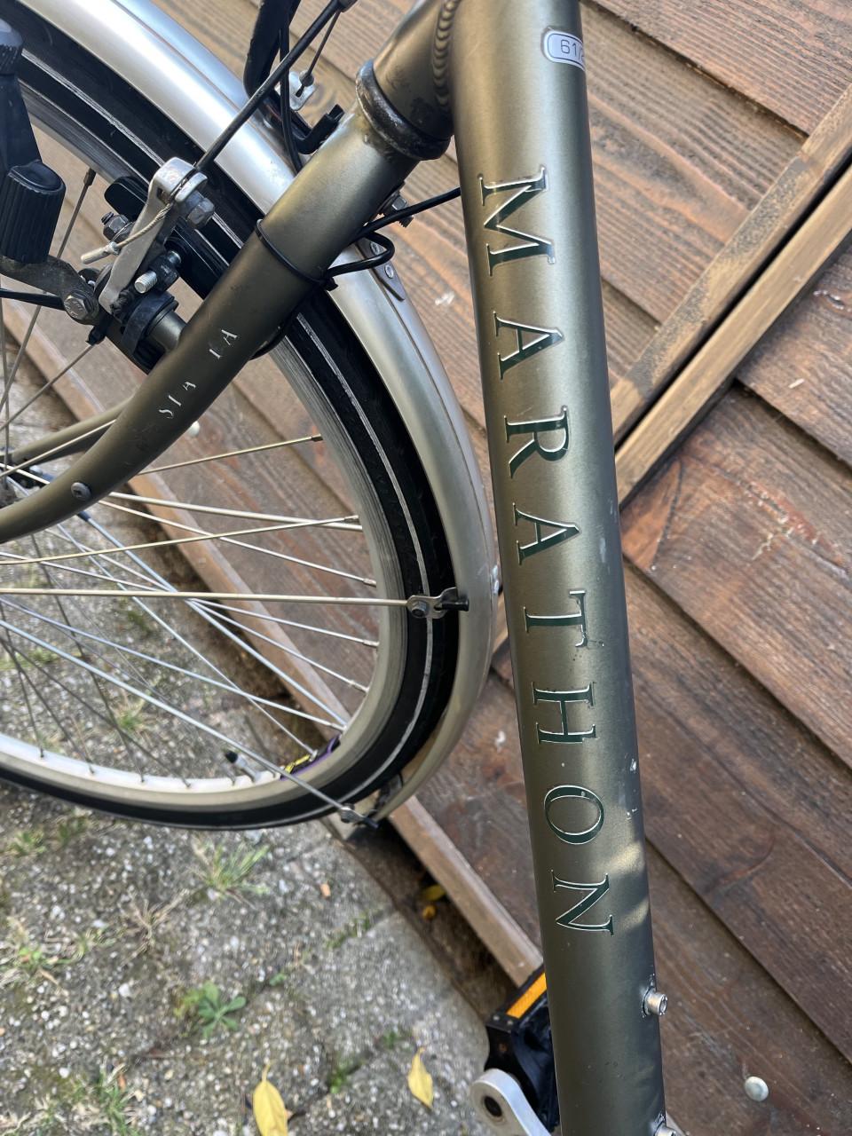 Herenfiets Sportfiets Sparta Marathon 21 versn. Velgrem, verlichting.
