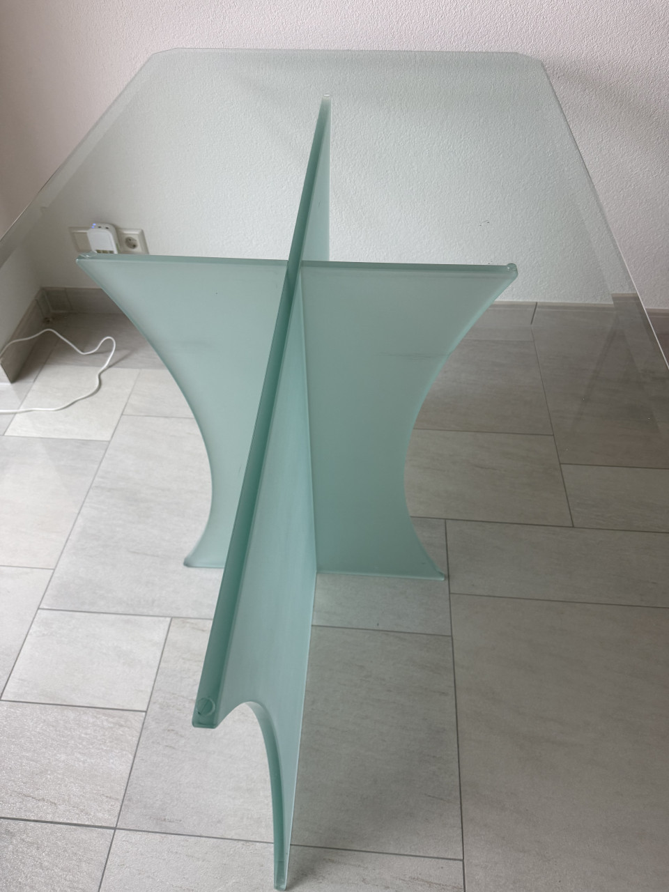 Mooie glazen eettafel met dubbele facet rand