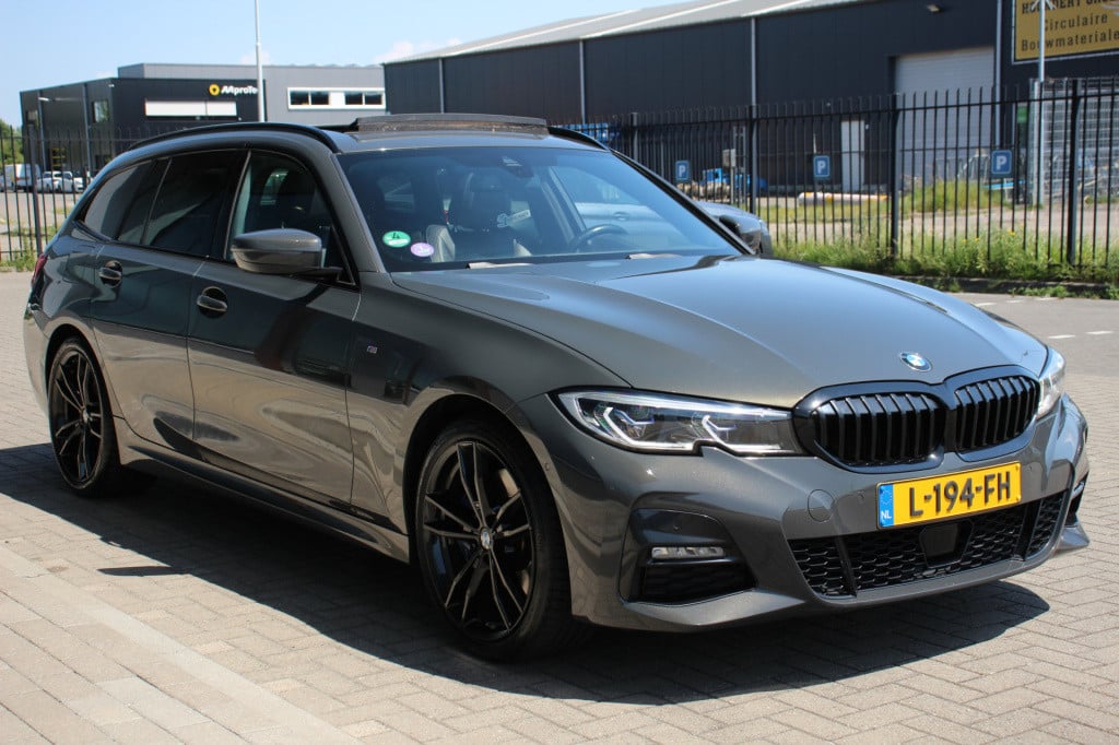 BMW 3-serie touring 320i high executive m pakket | pano | laser | leder