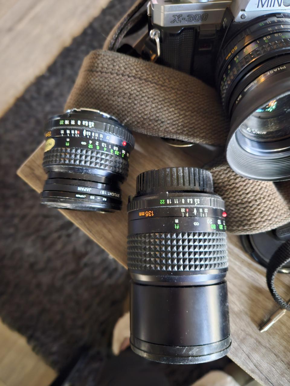 Vintage Minolta spiegelreflex camera X 300 met extra lenzen