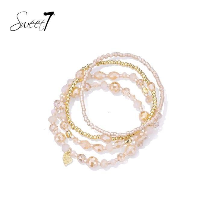 Armband set met camel kleurige kralen en goudkleurige details