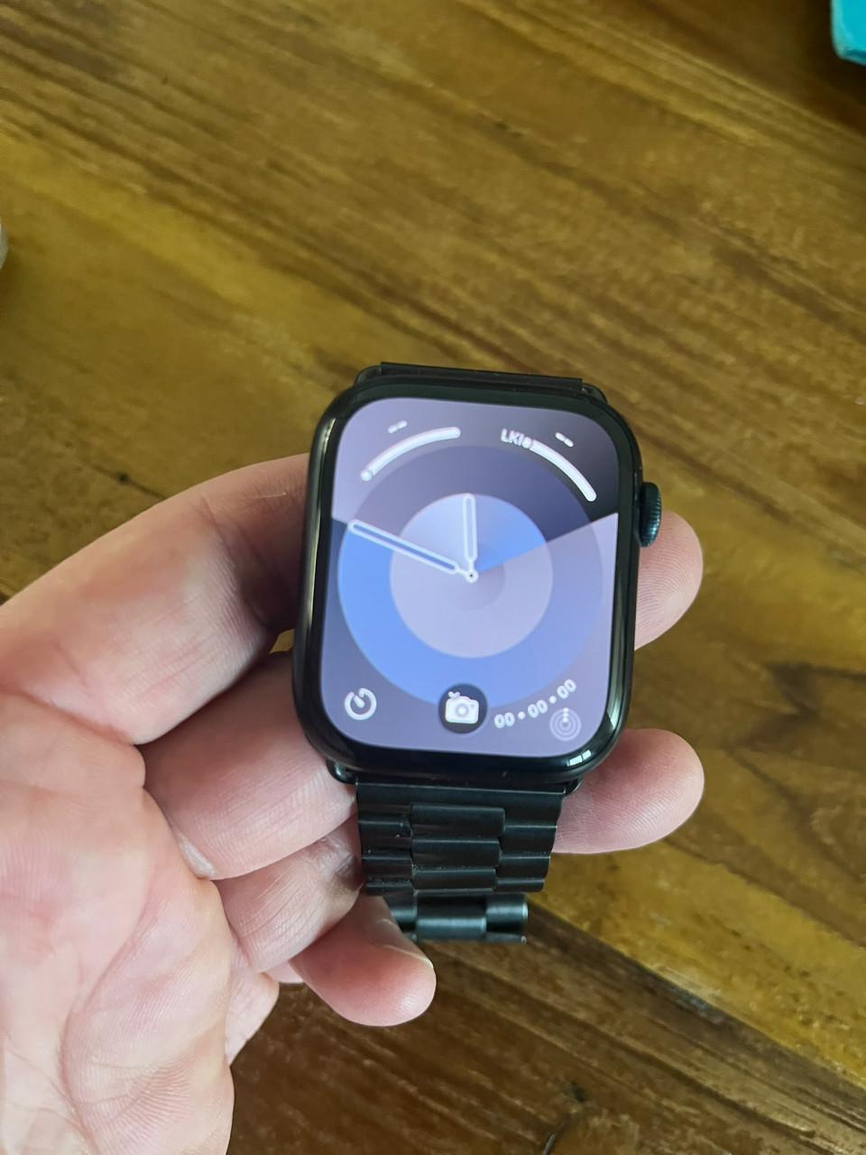 Apple Watch series 9 45 mm met stalen bandje en originele bandje
