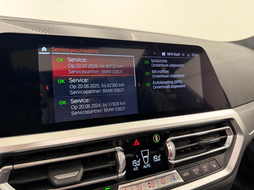 BMW 3-serie 330e m-sport | schuif/kanteldak | elektrische stoelen | verwarm
