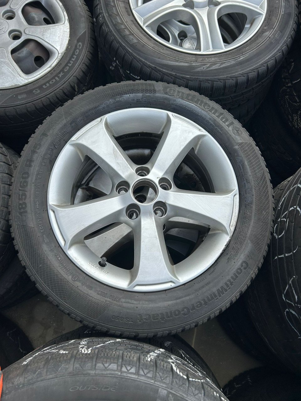 VW ALUMINIUM VELGEN MET CONTINENTAL ALL SEASON BANDEN