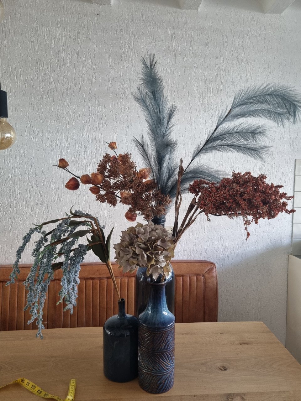 3 vazen met kusntbloemen