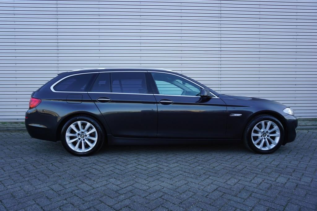 BMW 5 Serie touring 520i high executive automaat - climate / navi / cruise 