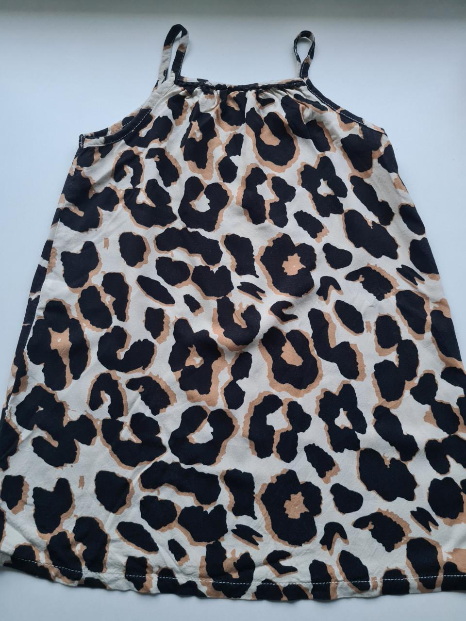 Leuk mouwloos blousje met trendy luipaardprint, voor de zomer. Mt 122-128