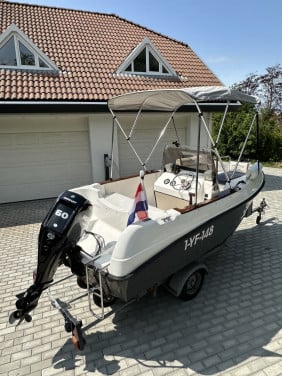 Mooie Elan 15SC met vrijwel nieuwe Mercury 60 pk en Pega trailer