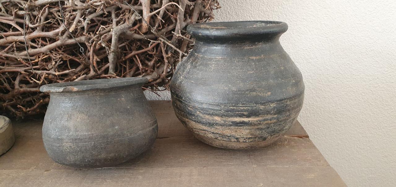 Oude tuimelpotjes prachtig doorleefd