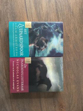 Boeken het luipaardspoor en de paardenfluisteraar