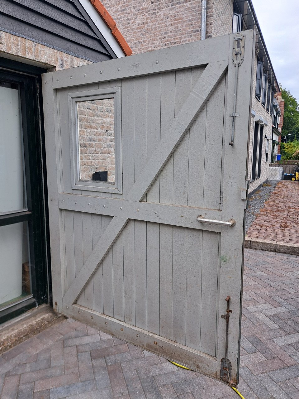 Hardhouten garage deuren
