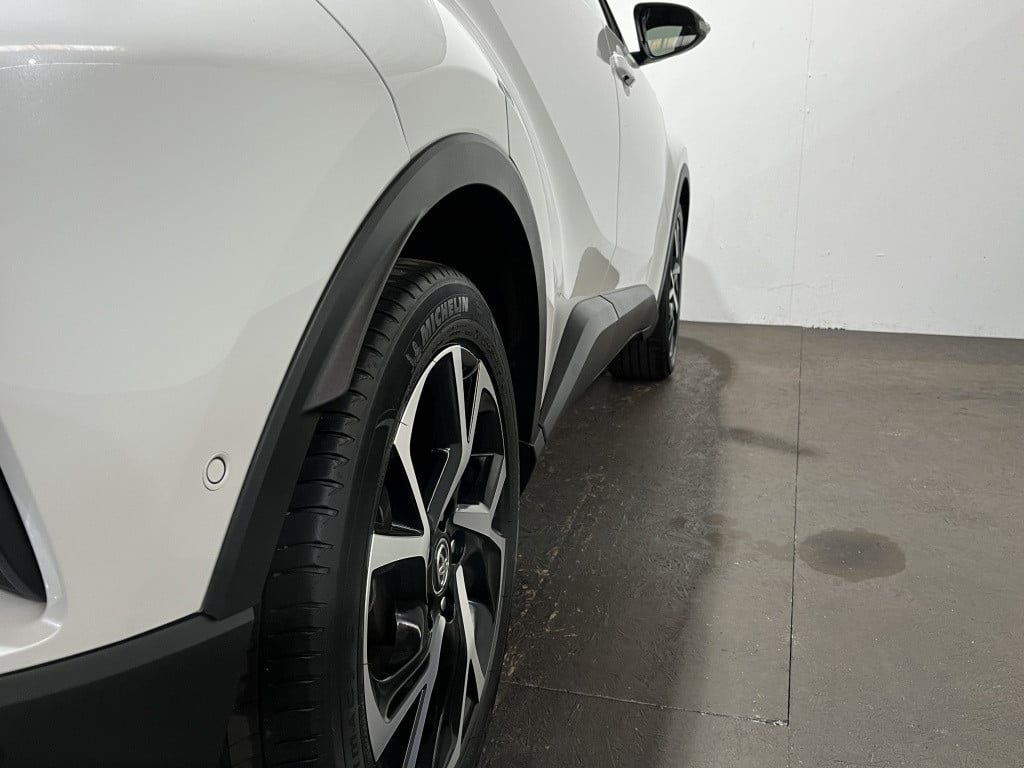 Toyota C-hr 1.8 hybrid bi-tone plus | leer | camera | trekhaak |