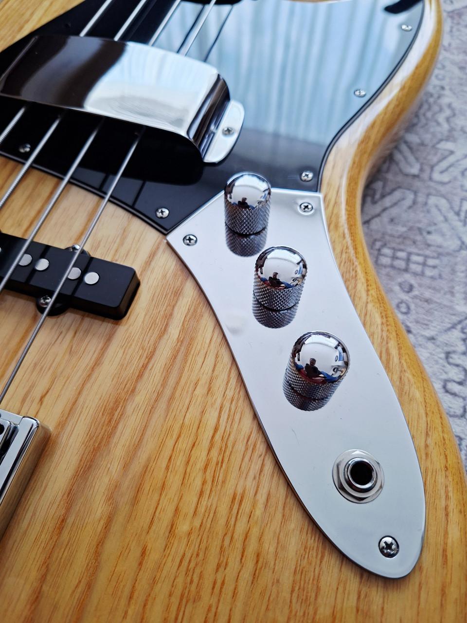 Fender Peterbuilt Jazz basgitaar naturel z.g.a.n.