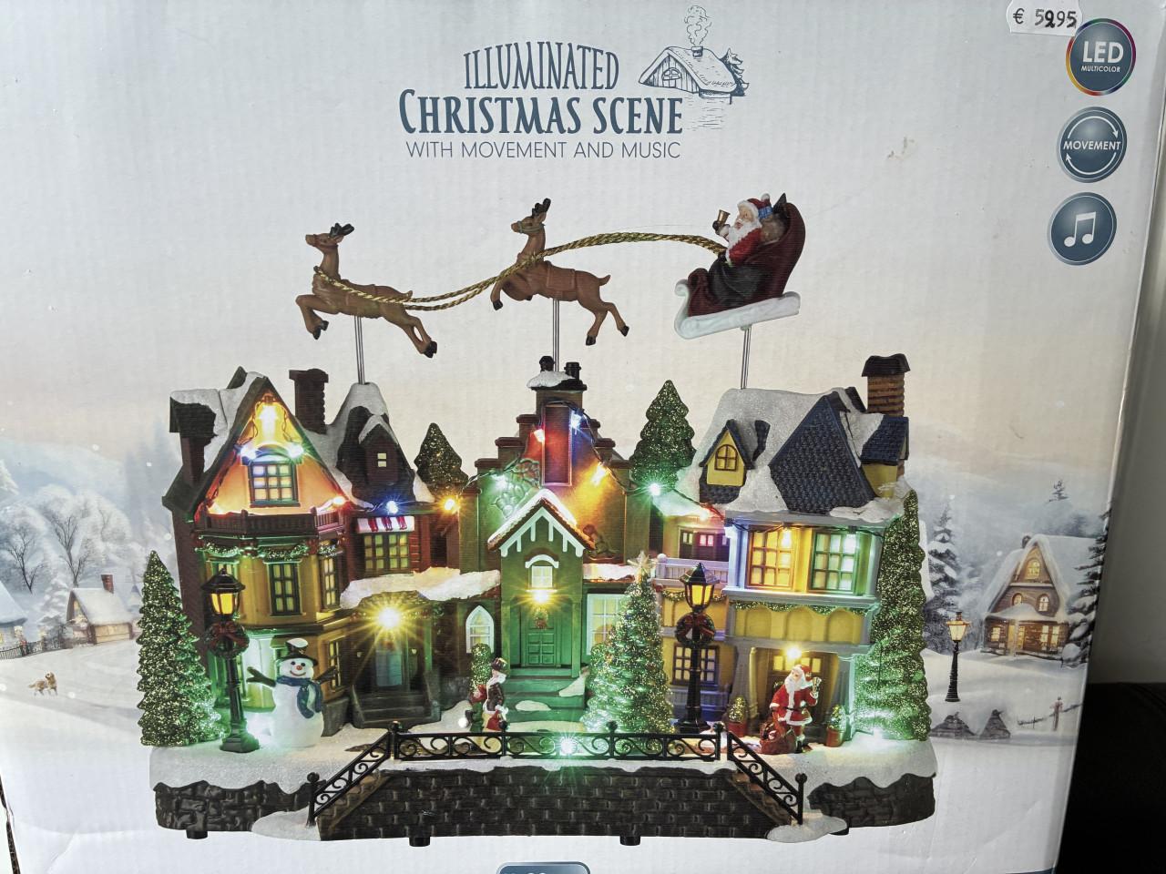 Kerstdorp met verlichting en muziek